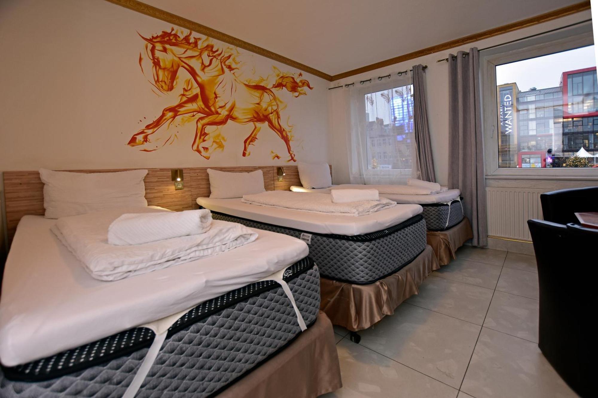 Dreibettzimmer mit eigenem Bad